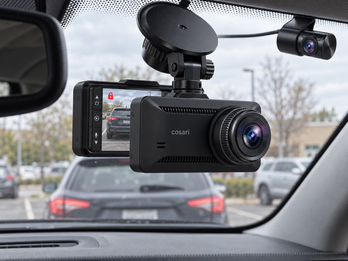 Vista D4 front camera on a windshield with a parked car outside